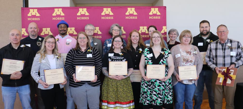 A group of UMN Morris faculty and staff with their awards. 