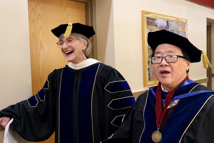 Chancellor Janet Schrunk Ericksen laughs with Acting Vice Chancellor for Academic Affairs and Dean Peh Ng.